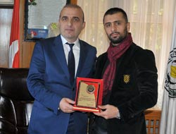 Şelçuk Aydın'a Plaket