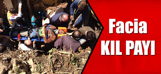 Düzköy'de çalışırken üzerine toprak kayan işçi yaralandı.